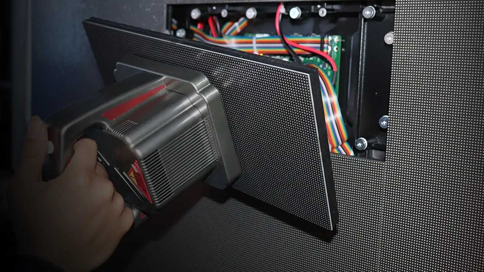 Front service magnetic tool allows rapid LED module swap